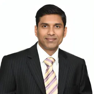 Dr. Karthikeyan Damodharan, Cleveland Clinic-trained Vascular and Interventional Radiologist, specializing in minimally invasive pinhole surgeries.